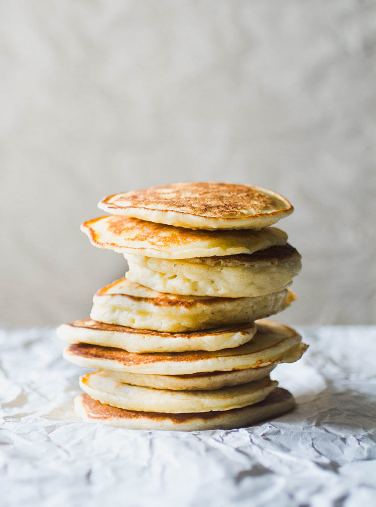 stack of 9 fluffy pancakes.