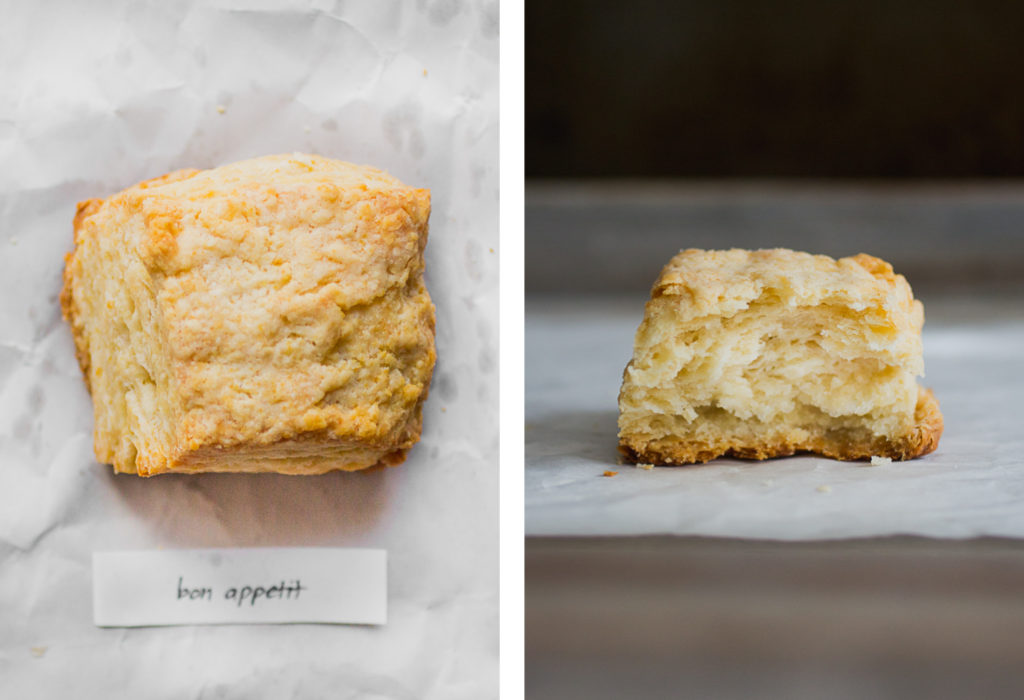 Overhead view and cross section of bon appetit biscuit recipe on white parchment paper