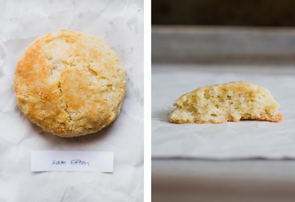 Overhead view and cross section of Sam Sifton biscuit recipe on white parchment