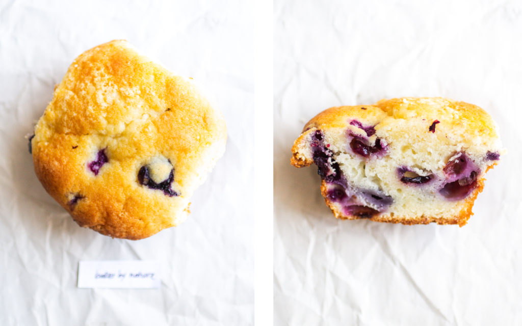baker by nature blueberry muffin overhead view and cross section