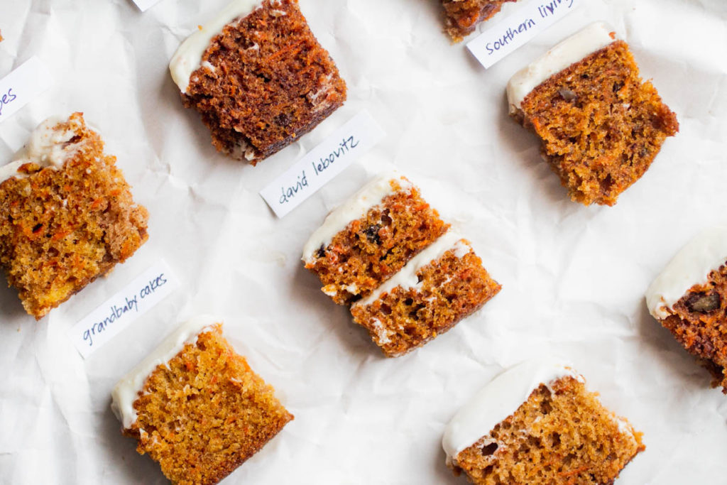 Small slices of different carrot cake recipes on parchment paper