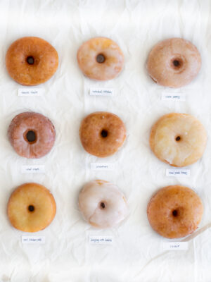 9 donuts on a white background
