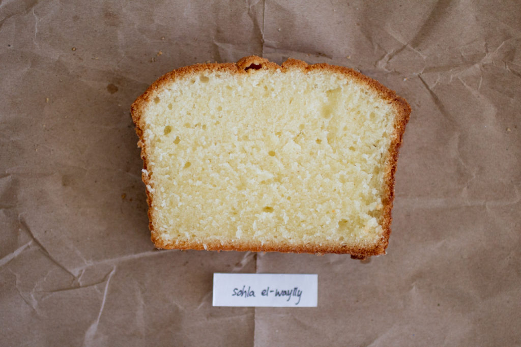 slice of pound cake on a brown paper background