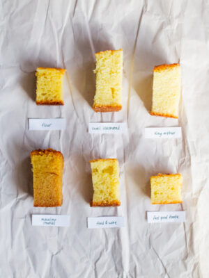 6 different slices of olive oil cake on a white background.