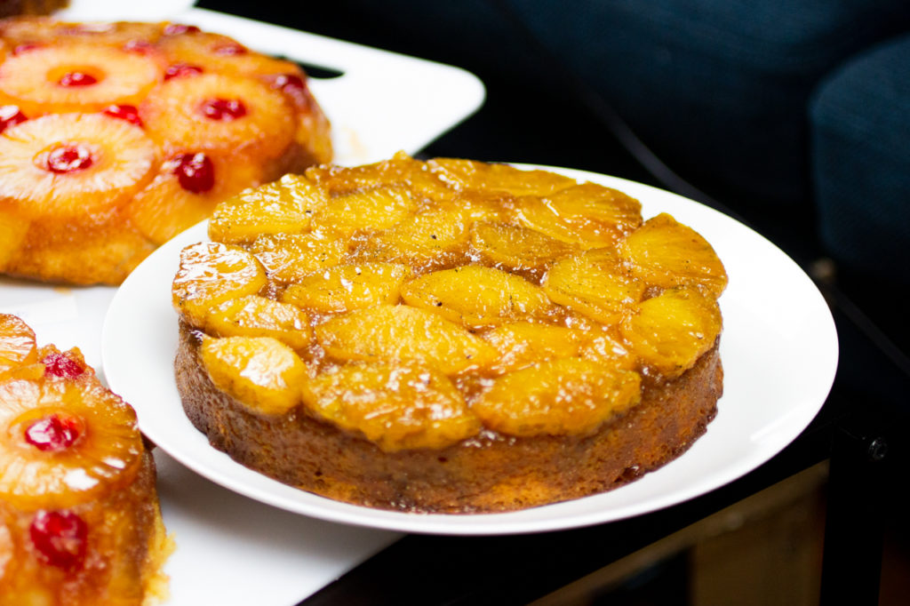 pineapple upside down cake on a white plate