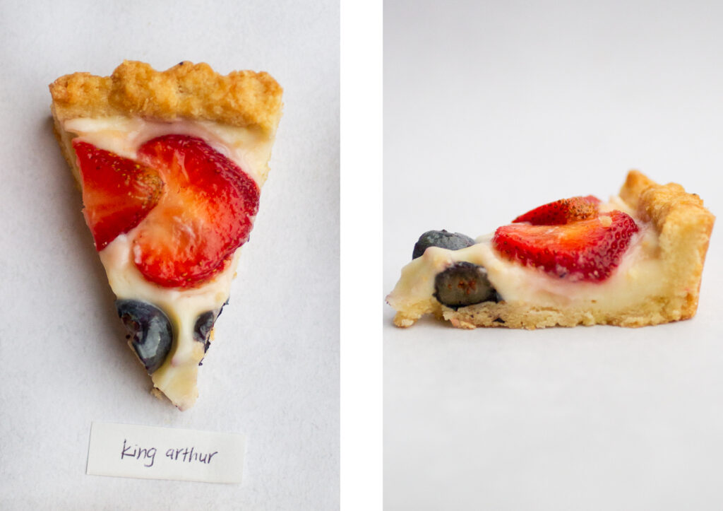 side by side shot of a slice of the king arthur fruit tart from the top next to the side view.