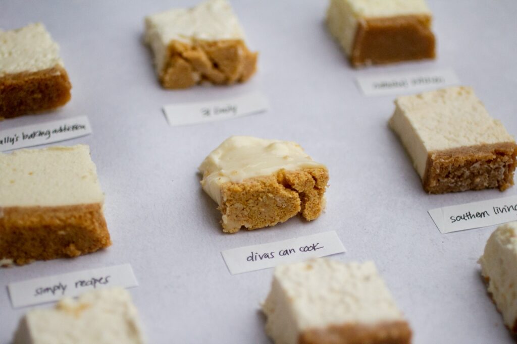 close up of divas can cook cheesecake on a gray background.