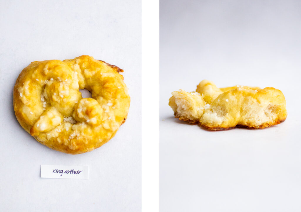 a soft pretzel labeled \"king arthur\" next to a shot of the pretzel interior.