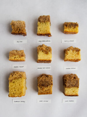 9 crumb cakes on a gray background.