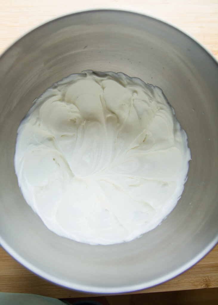 Whipped cream in a bowl.