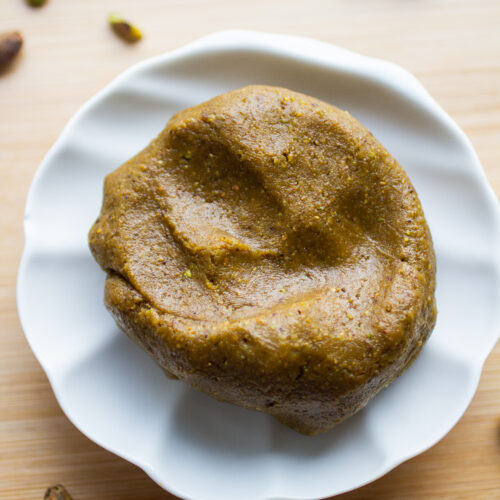 pistachio paste on a white plate.