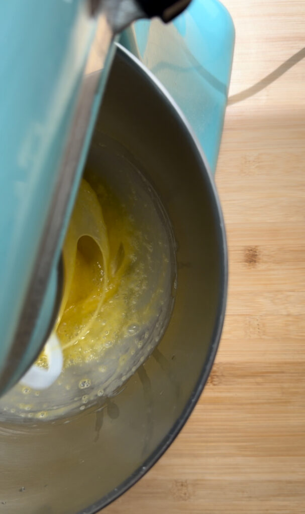 Whipping eggs in a stand mixer.