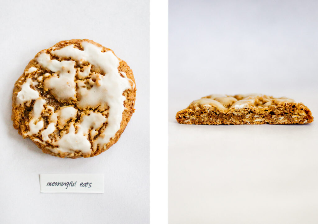 Meaningful Eats\' iced oatmeal cookie on a gray background.